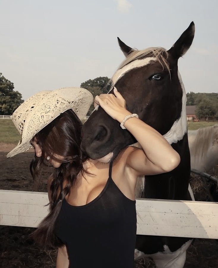 Girl and horse, straw hat