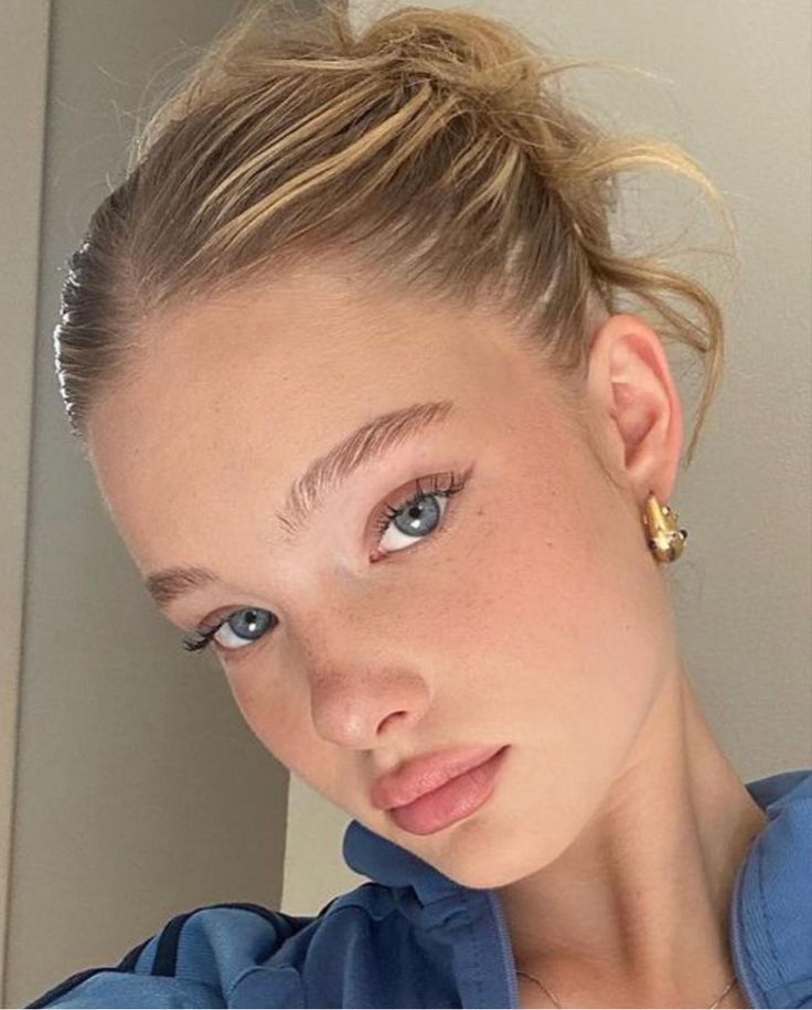 Clean girl makeup — dewy skin, brushed brows