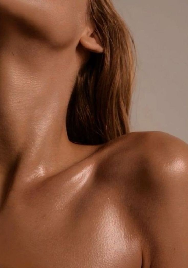Lit collarbones and shoulders