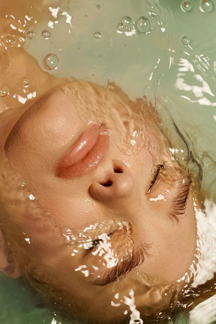 Face in water — quiet, submerged
