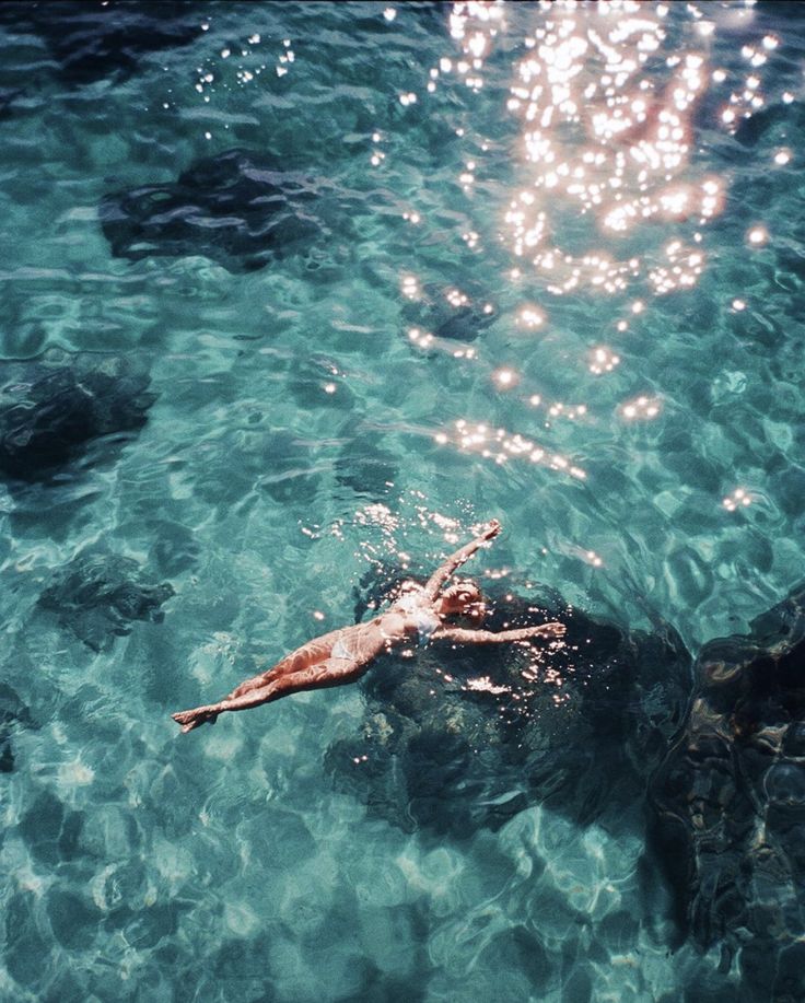 Floating in Hawaiian water — light on the surface
