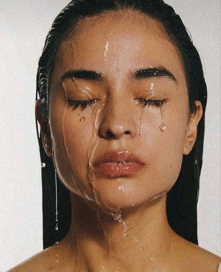 Water streaming down the face