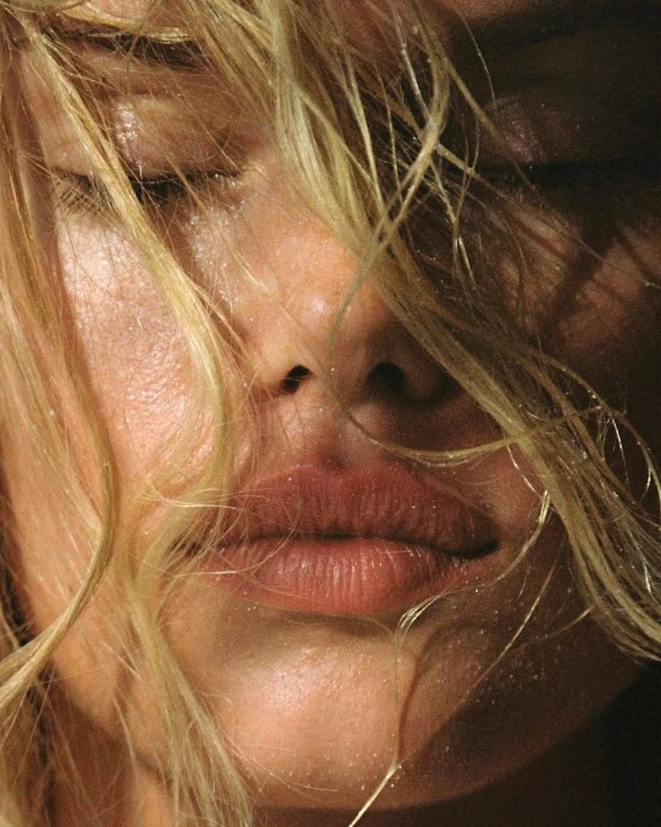 Windswept blonde — close, warm