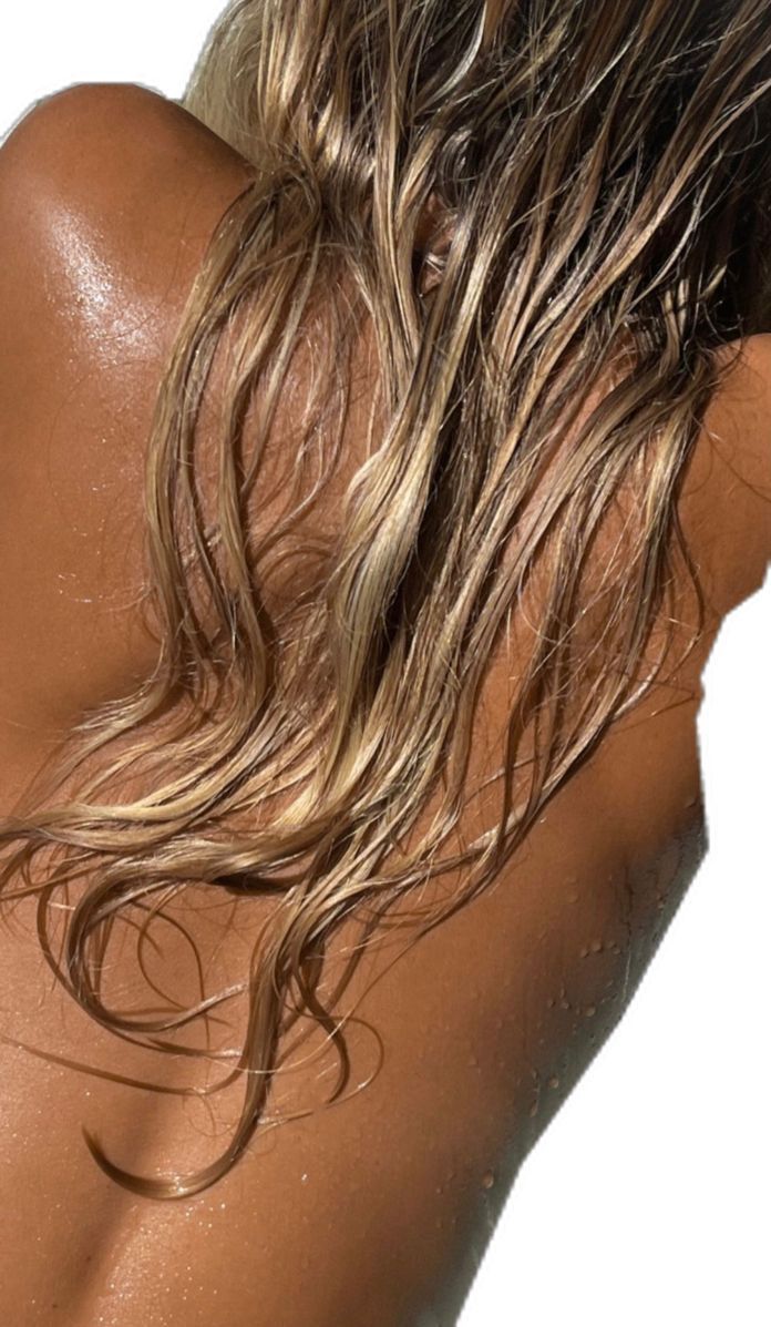 Wet golden hair down the back