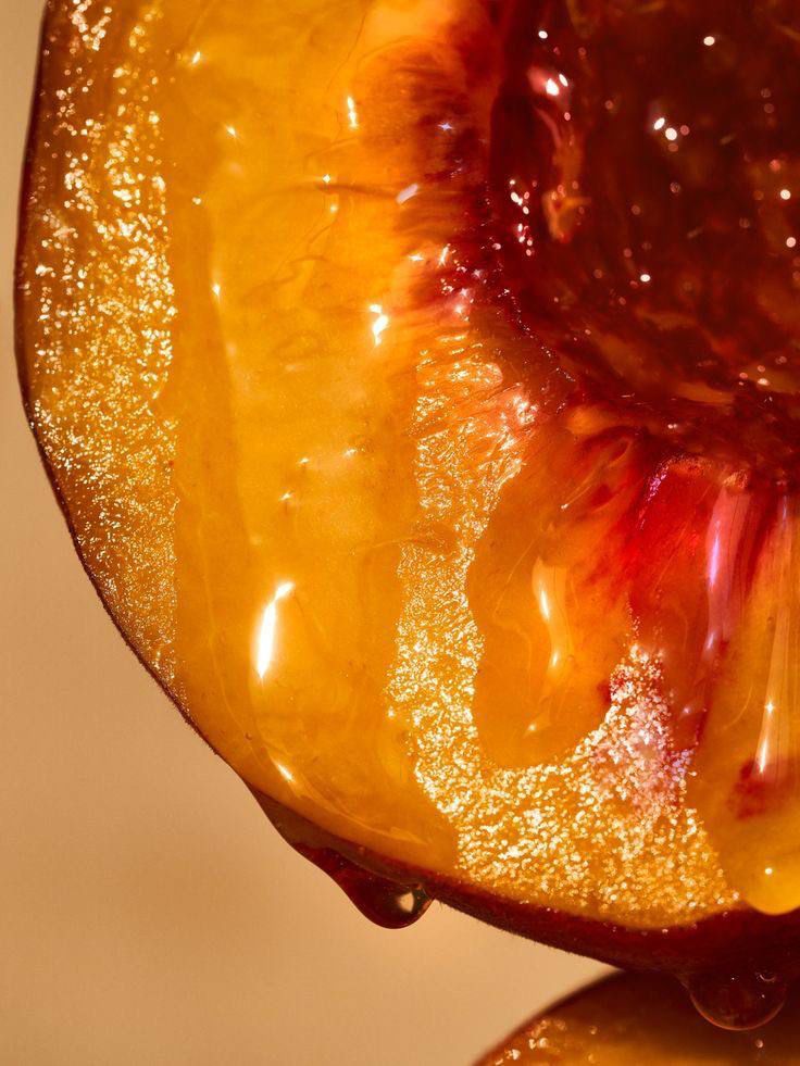 Glazed peach — sticky, sunlit